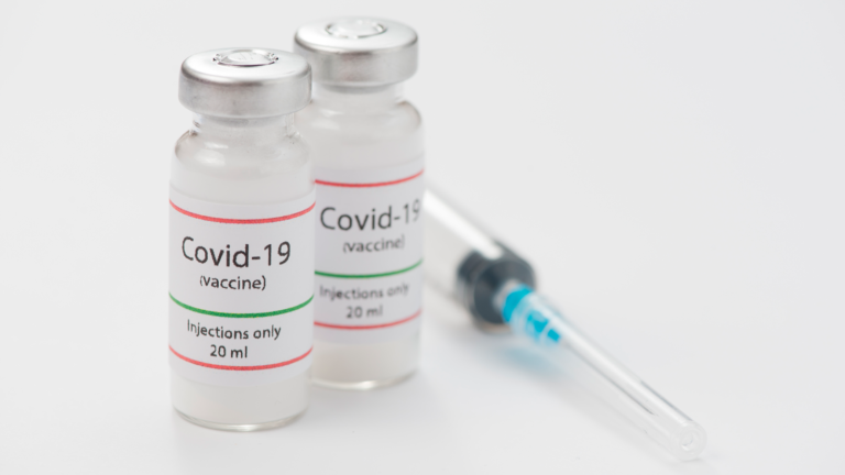 covid-19 vaccine and syringe